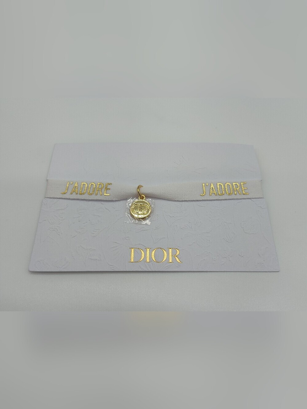 CHRISTIAN DIOR J’ADORE Ribbon Bracelet Gold CD Charm White Cotton NIP - Picture 5 of 7
